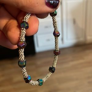 Mood beads that sparkle with sterling silver and a lobster claw closure